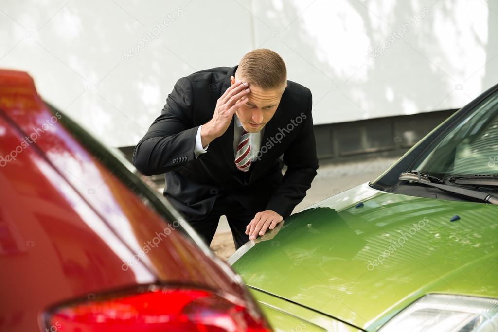 Driver Looking At Car