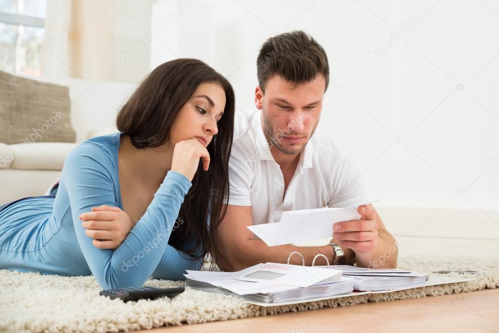 Couple Calculating Bills