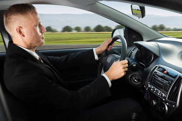 Confident Businessman Driving Car — Stock Photo, Image