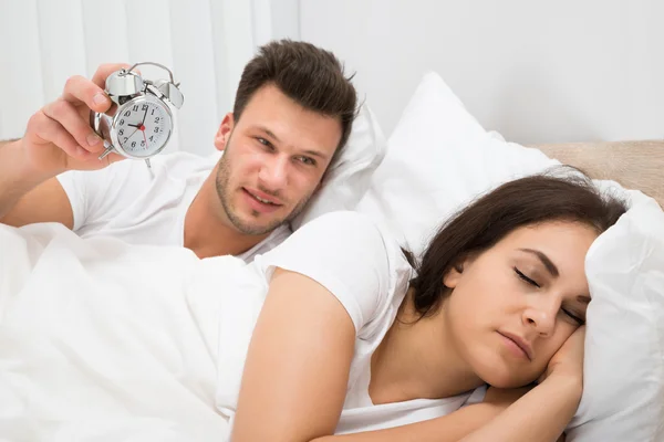 Man Holding Alarm Clock — Stock Photo, Image