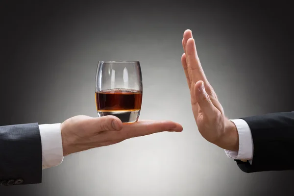 Businessman Hand Reject Glass Of Whisky — Stock Photo, Image