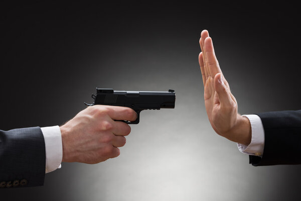 Businessman Hand With Gun