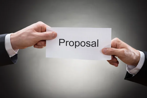 Businessmen Hands Holding Paper with Proposal — Stock Photo, Image