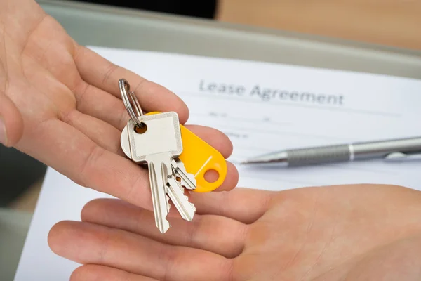 Person Holding Key — Stock Photo, Image