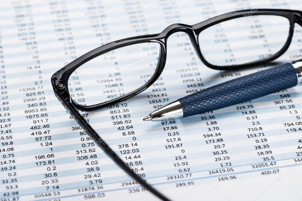 Financial Document with Eyeglasses