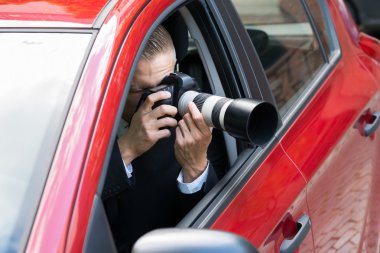 Man Photographing With Slr Camera clipart