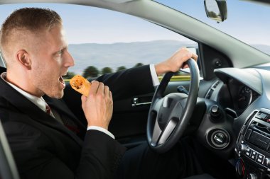 Businessman Eating Snack