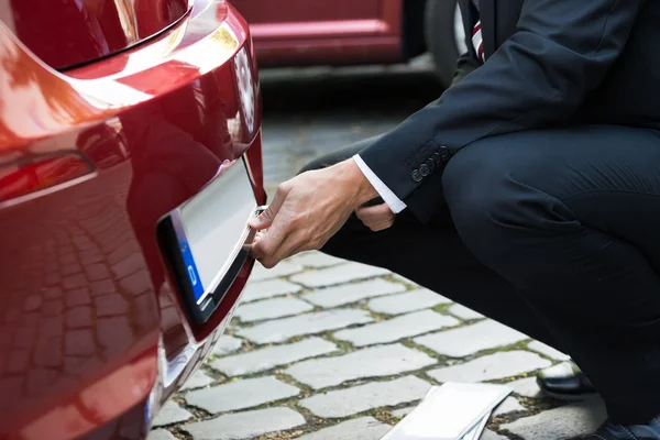 Man Holding Number Plate — Stock Photo, Image