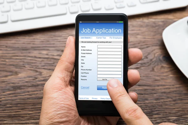 Hands Filling Job Application — ストック写真