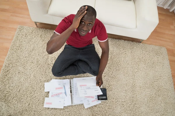 Worried Man With Financial Documents — ストック写真