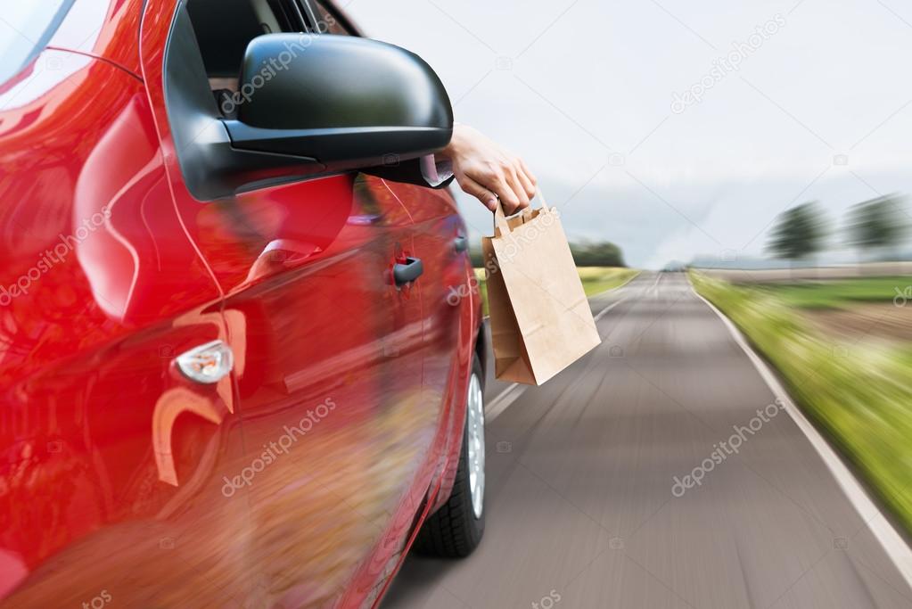Person Throwing Trash Out Of Car