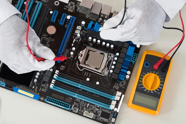 Hands Checking Motherboard — Stock Photo, Image