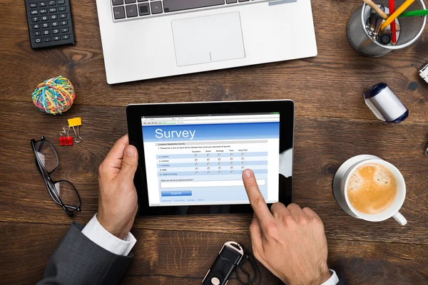 Businessman Filling Online Survey Form — Stock Photo, Image