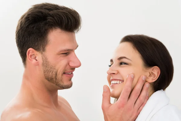 Man Applying Moisturizer Royalty Free Stock Images