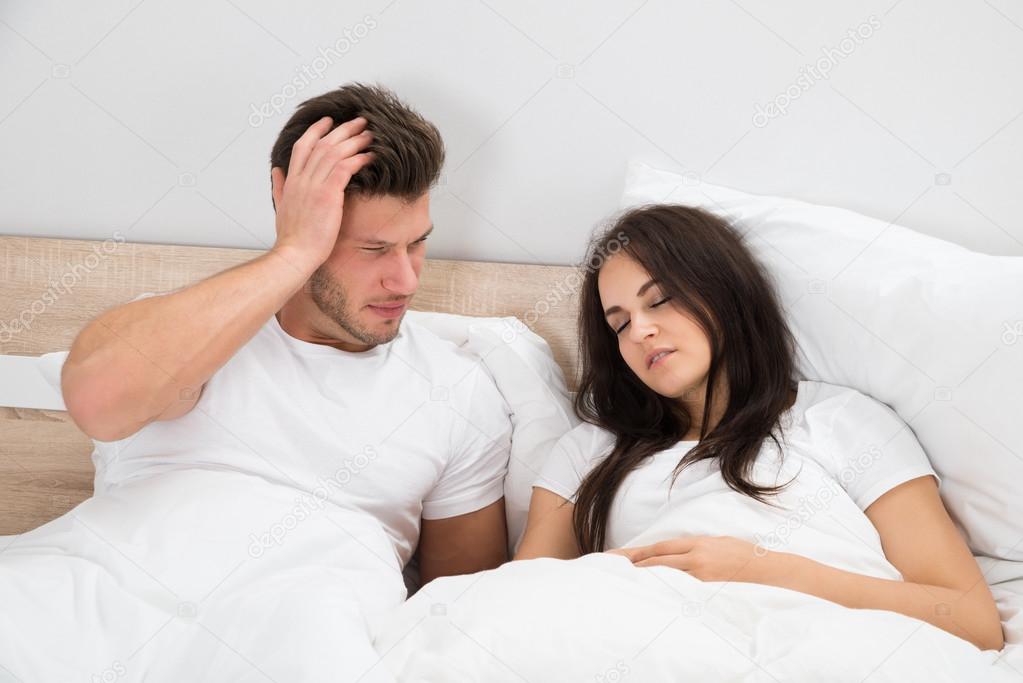 Woman Snoring In Bed