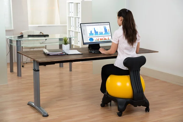 Businesswoman Sitting On Fitness Ball — Stock Photo, Image