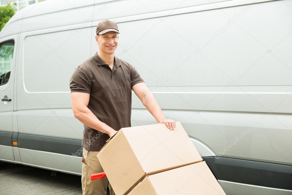 Delivery Man With Cardboard Boxes