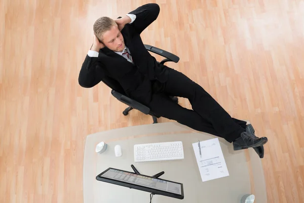 Businessman Relaxing On Chair — Stock Photo, Image