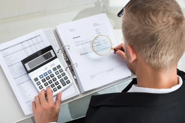 Businessman Checking Invoice — Stock Photo, Image