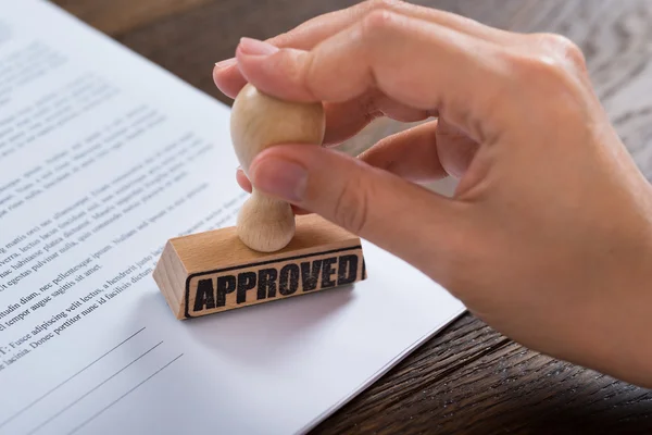 Hands With Stamper And Document — Stock Photo, Image