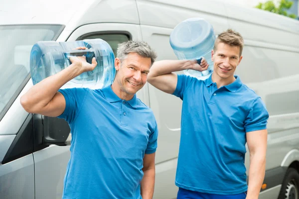 Delivery Men Delivering Bottles — Stock Photo, Image