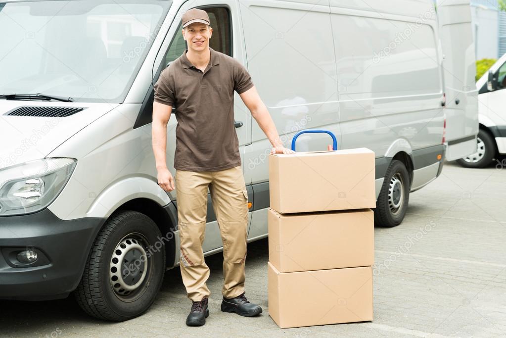 Delivery Man With Cardboard Boxes