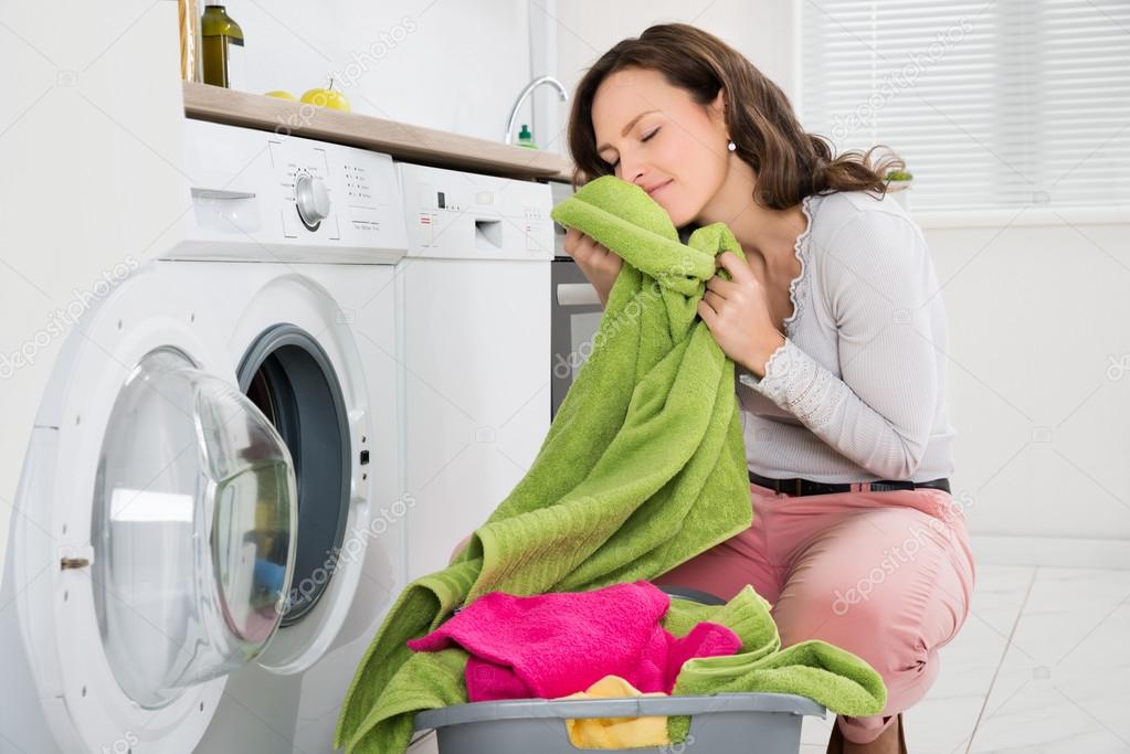 Woman Crouching With Clothes