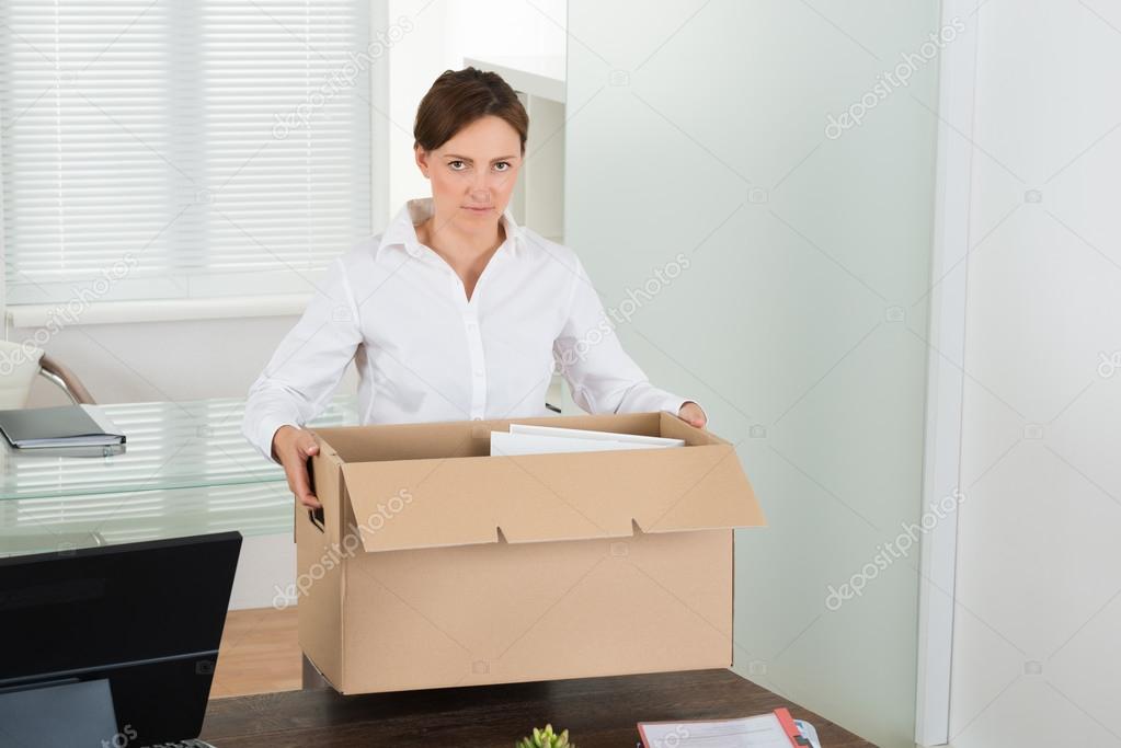Businesswoman Packing Her Belongings