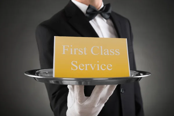 Waiter Giving Plate With The Text On Board — Stock Photo, Image