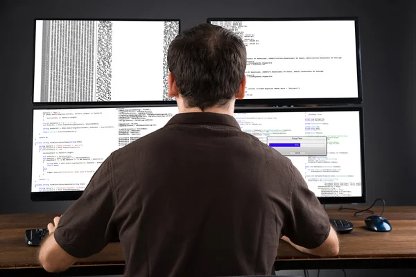 Man Programming Code On Computers — Stock Photo, Image