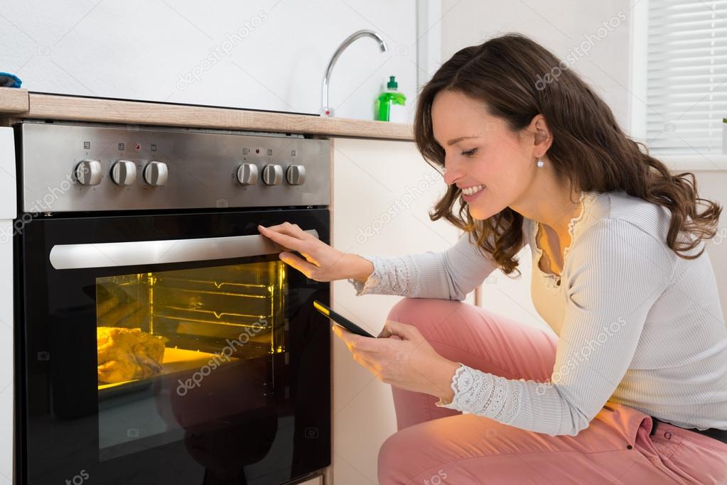 Woman While Cooking Chicken