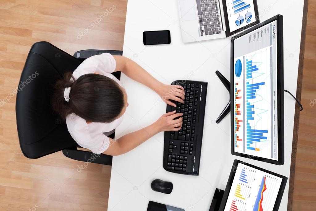 Businesswoman Working With Graphs