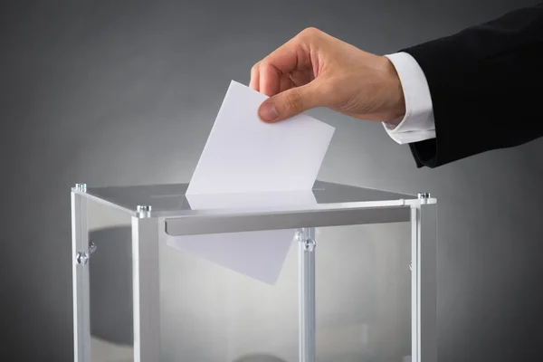 Businessperson Putting Ballot In Box — Stock Photo, Image