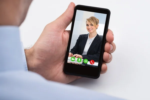 Businessperson Videochatting On Mobile Phone — Stock Photo, Image