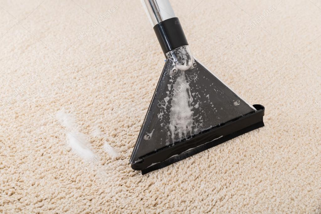 Vacuum Cleaner On Wet Rug Stock Photo by ©AndreyPopov 84501916