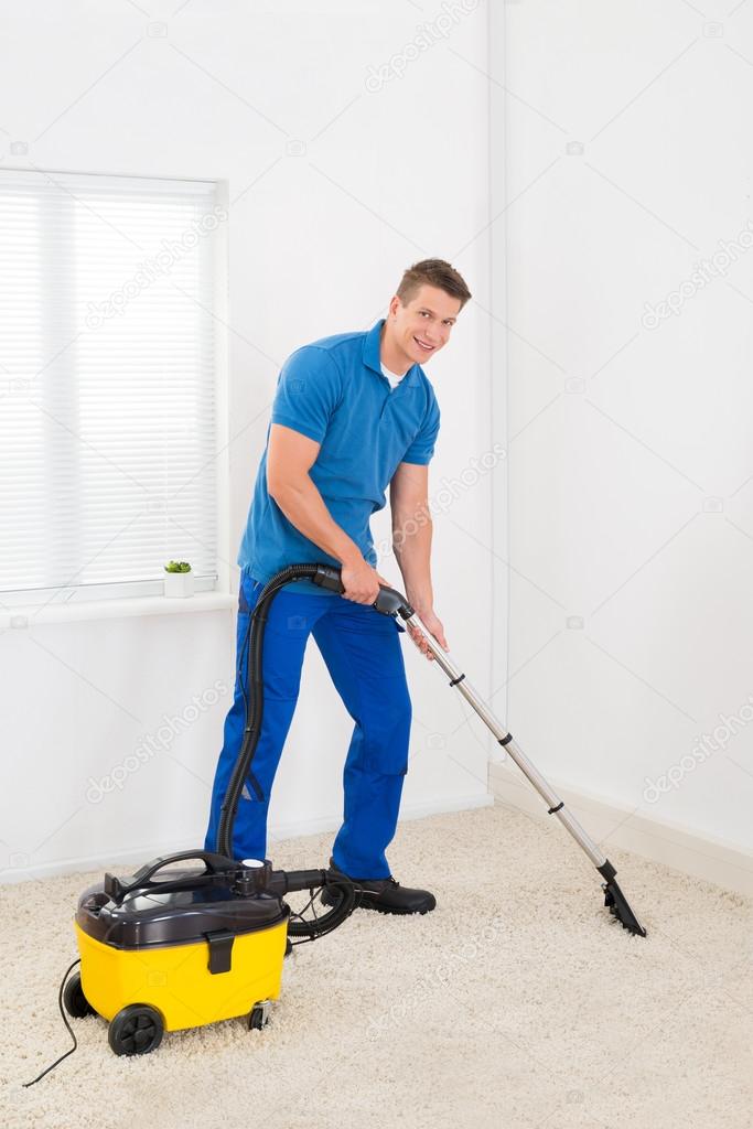 Janitor Cleaning Carpet