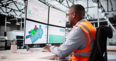 Genç Afrikalı Amerikalı Adam Bilgisayar Monitöründe Mekanik Ürün Tasarımı Geliştiriyor.