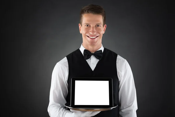 Butler Holding Tray With Digital Tablet — Stock Photo, Image