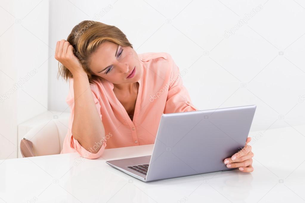 Tired Woman With Laptop