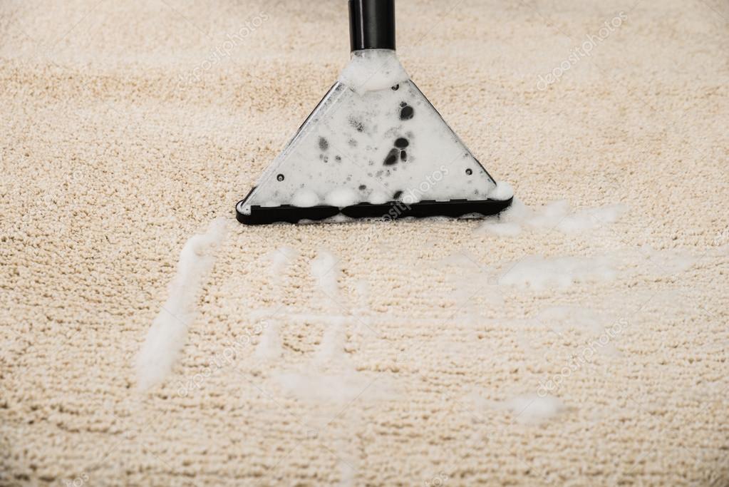 Vacuum Cleaner Over Carpet — Stock Photo © AndreyPopov 84928832