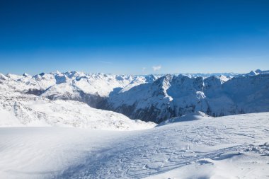 Winter Landscape Of A Ski Resort In The Alps clipart