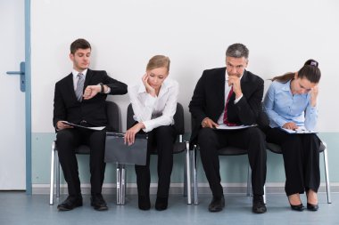 Businesspeople Waiting For Job Interview