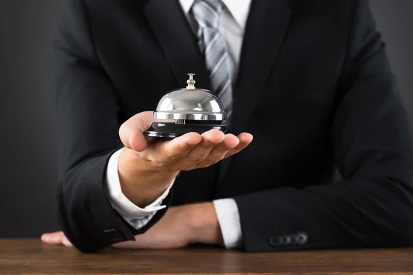 Businessperson Hands Holding Service Bell — Stock Photo, Image