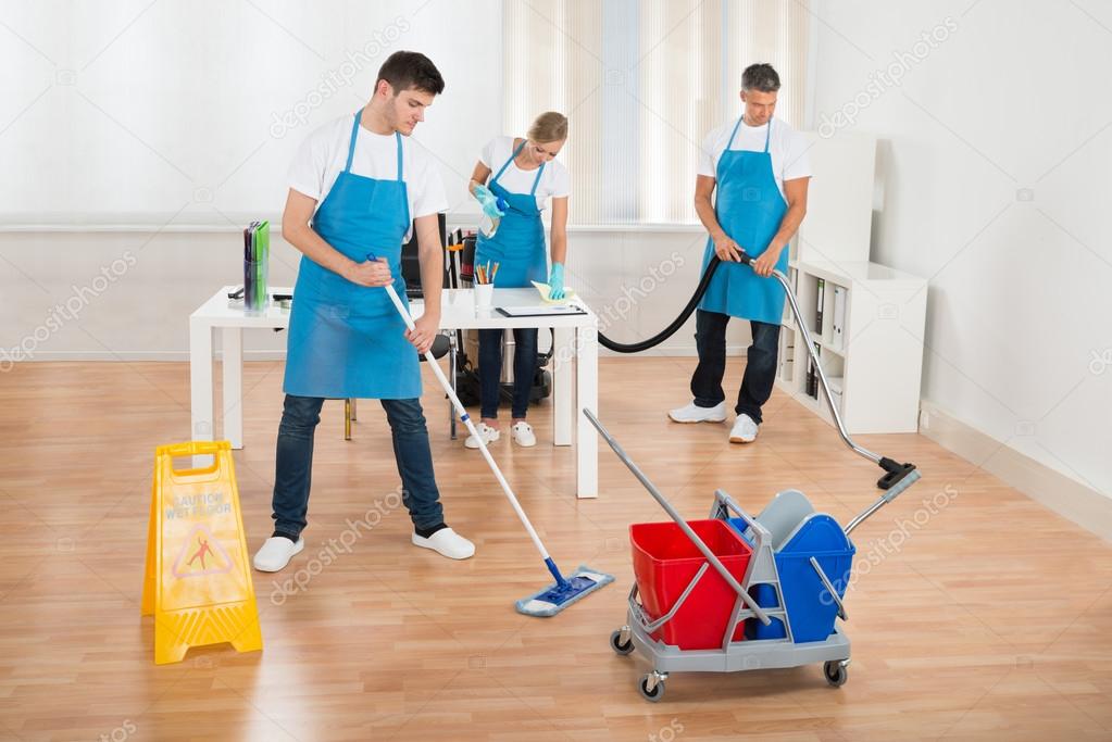 Cleaners Team Cleaning Floor