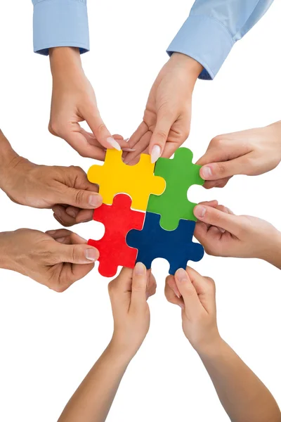 People Hands Holding Jigsaw Pieces — Stock Photo, Image