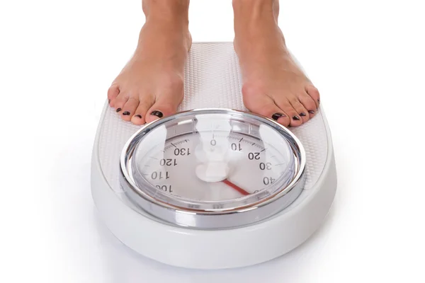 Woman Standing On Weighing Scale — Stock Photo, Image
