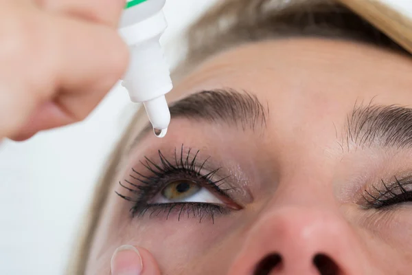 Woman Applying Eye Drop — Stock Photo, Image