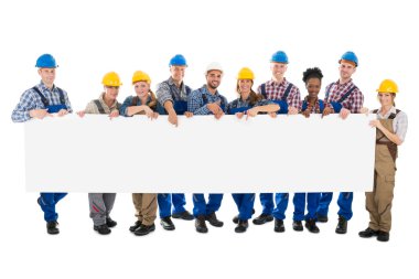 Construction Workers Holding Blank Billboard clipart