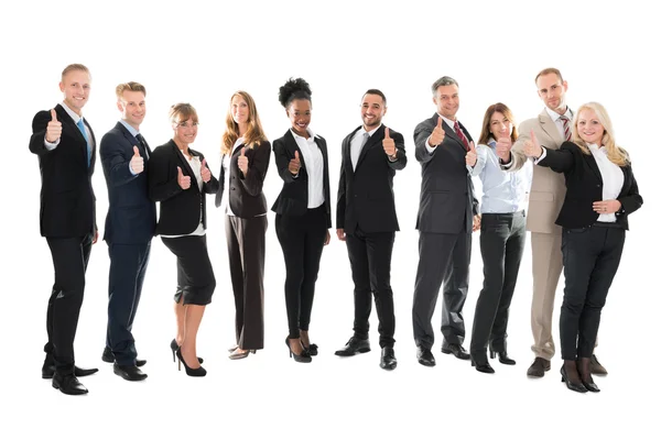 Equipe de negócios mostrando polegares para cima — Fotografia de Stock