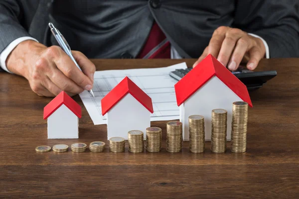 Businessman Calculating Tax — Stock Photo, Image